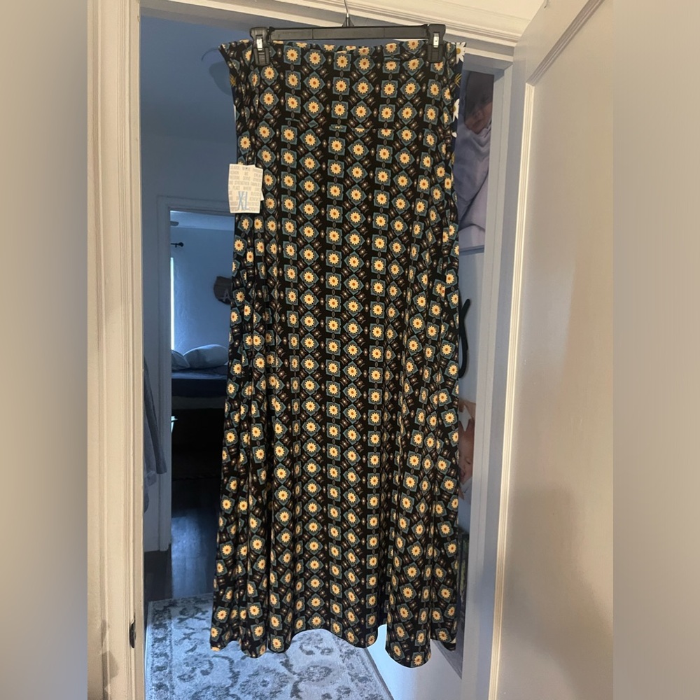 LuLaRoe Maxie skirt. Wear as a strapless dress or maxi skirt. Stretchy material